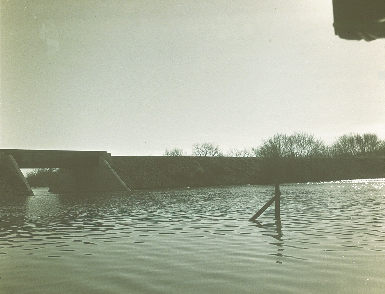 The rising waters under a railway crossing
