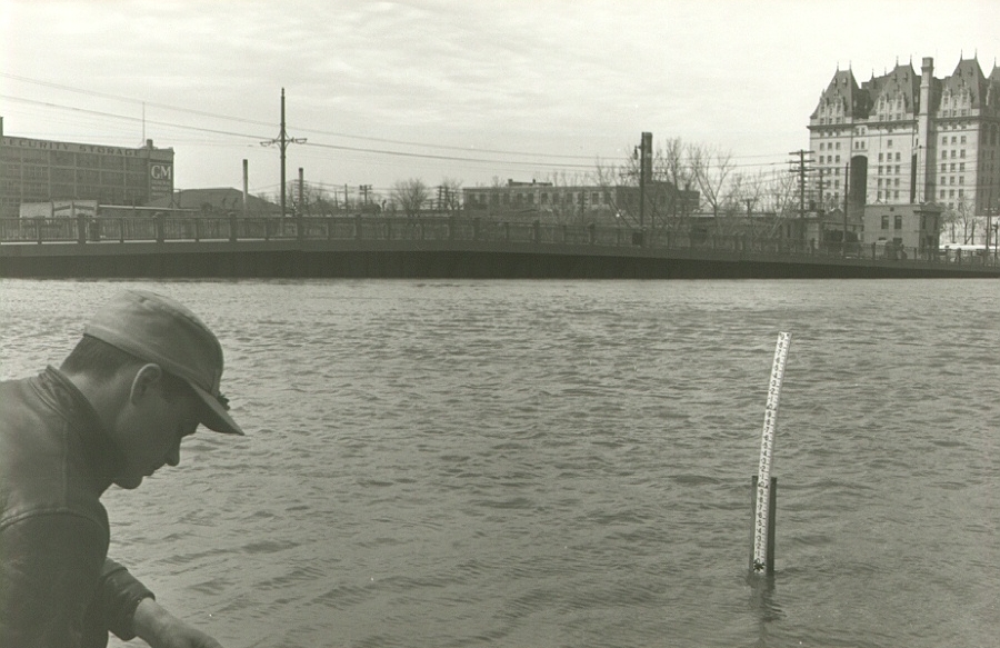 The rising Red River with the Fort Garry Hotel in the background