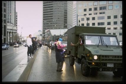 Military personnel return home.