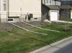 Improperly placed downspout photo 2