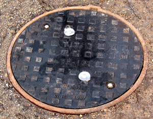 Lock and seal cover for tampering and infiltration protection